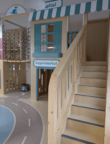 Little ones playing with wooden toys at Cupcake Kangaroo
