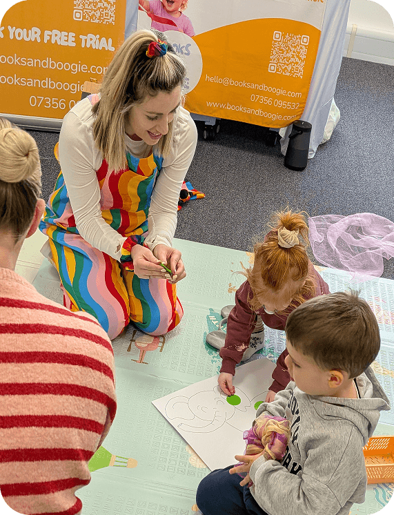 Toddlers singing and dancing at a Books & Boogie session